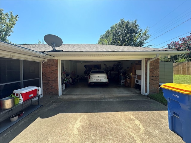 view of car parking featuring a garage