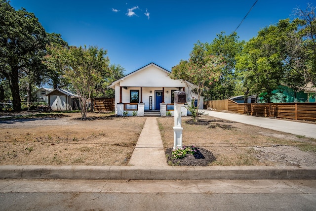 bungalow-style home featuring covered porch