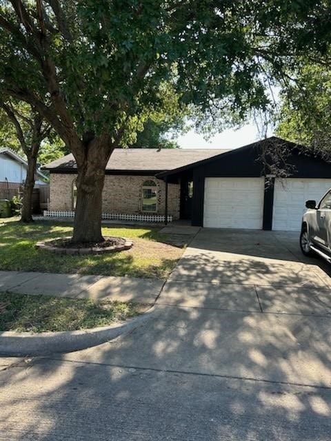 ranch-style home with a garage