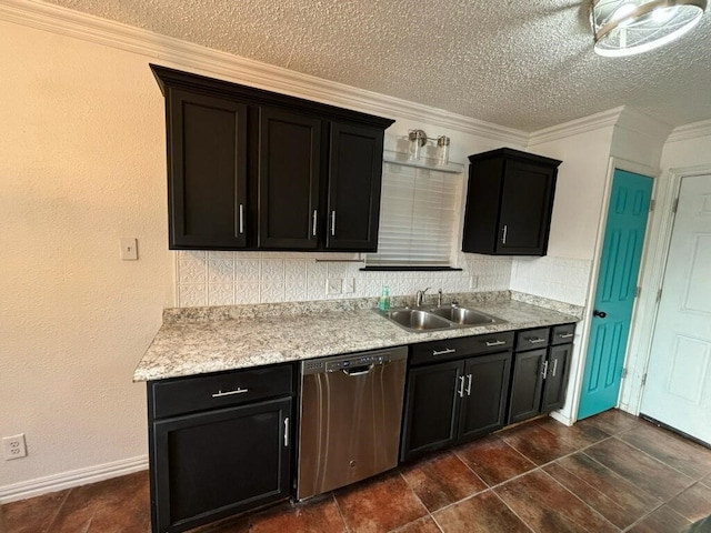 kitchen with sink, a textured ceiling, stainless steel dishwasher, and dark tile patterned flooring