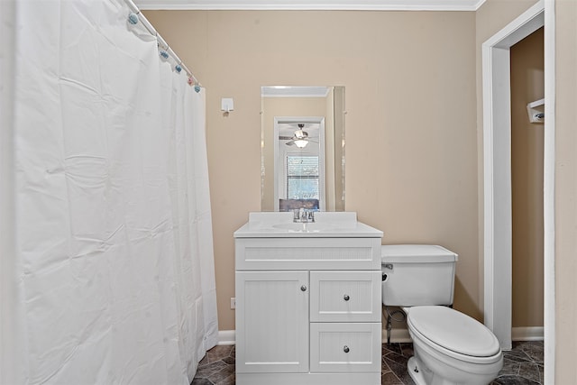 bathroom with tile patterned flooring, crown molding, vanity, and toilet