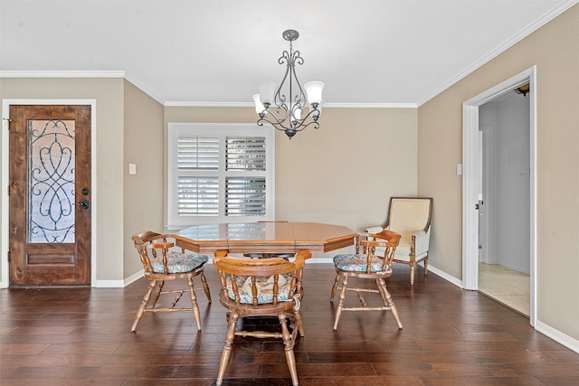 dining room featuring crown molding, an inviting chandelier, and dark hardwood / wood-style floors