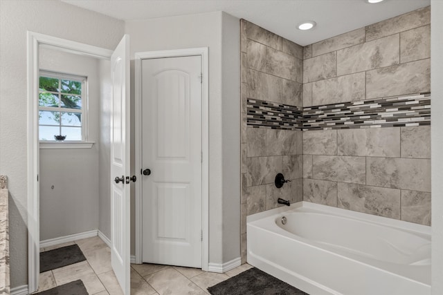 bathroom with tile patterned flooring