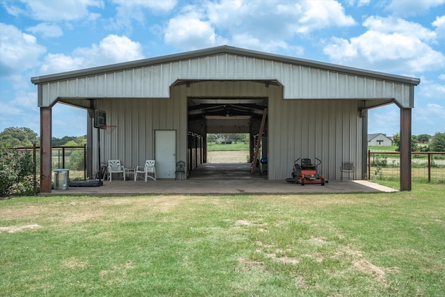 view of outbuilding with a lawn