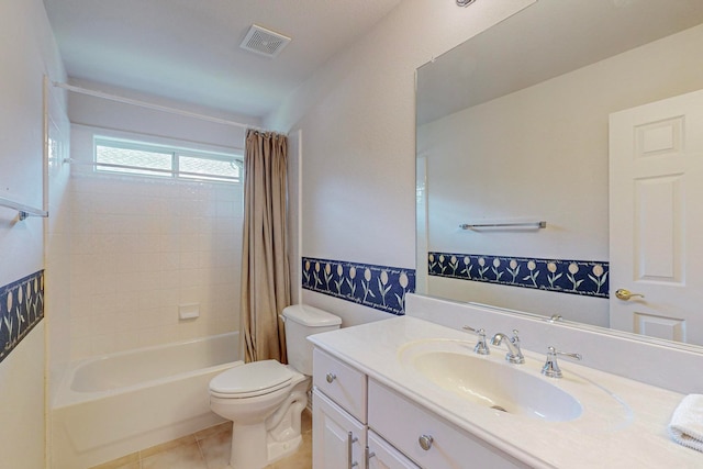 full bathroom with vanity, tile patterned flooring, shower / tub combo, and toilet