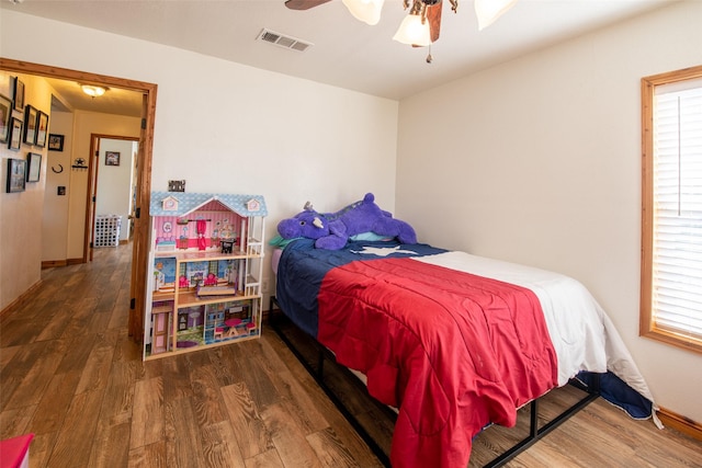 1204 County Road 122, Hico, TX 76457 - bedroom featuring visible vents, ceiling fan, and wood finished floors