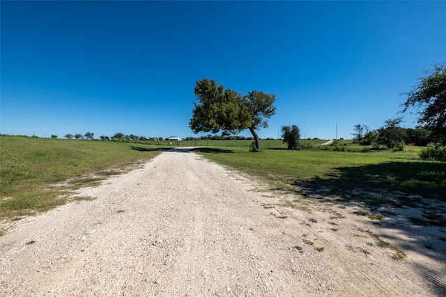 view of road featuring a rural view