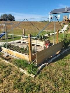 1204 County Road 122, Hico, TX 76457 - exterior space with a garden and a rural view