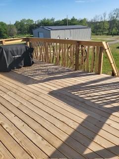 1204 County Road 122, Hico, TX 76457 - view of wooden terrace