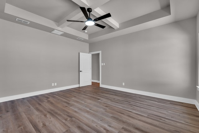 unfurnished room featuring ceiling fan and hardwood / wood-style flooring