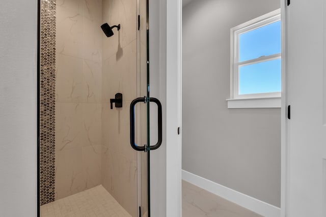 bathroom featuring walk in shower