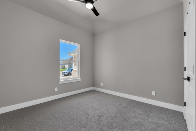 empty room featuring ceiling fan and carpet floors