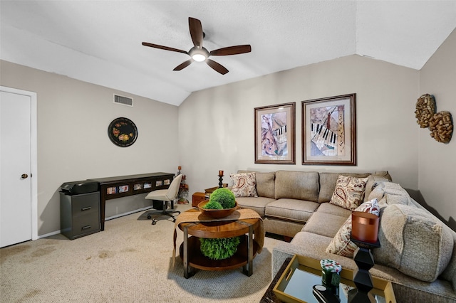 carpeted living room featuring lofted ceiling and ceiling fan