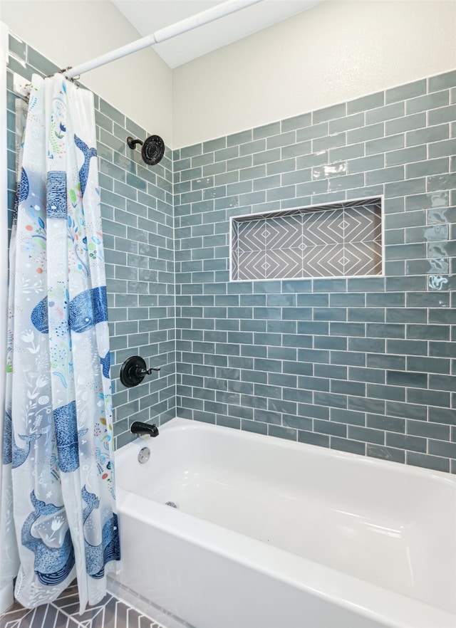 bathroom featuring shower / bathtub combination with curtain