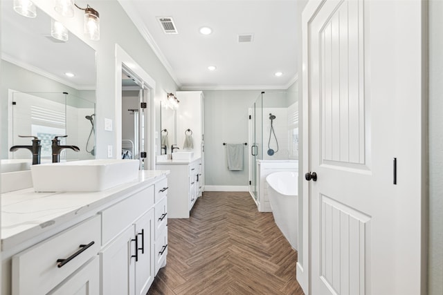 bathroom with parquet floors, shower with separate bathtub, ornamental molding, and vanity