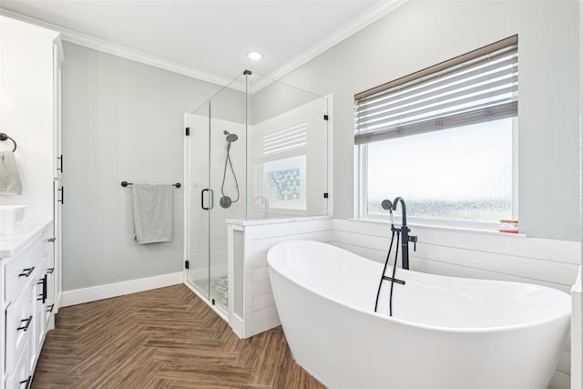 bathroom with independent shower and bath, parquet flooring, crown molding, and vanity