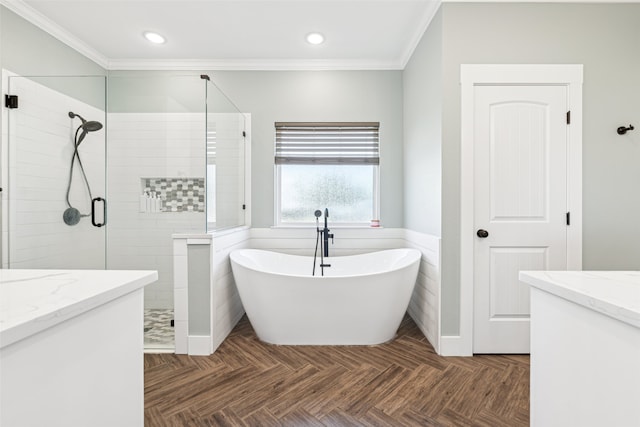 bathroom featuring ornamental molding, vanity, parquet flooring, and independent shower and bath