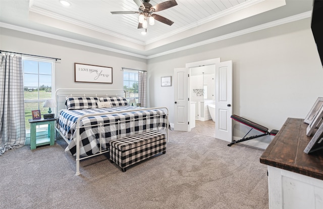 bedroom with ceiling fan, crown molding, a raised ceiling, and light carpet