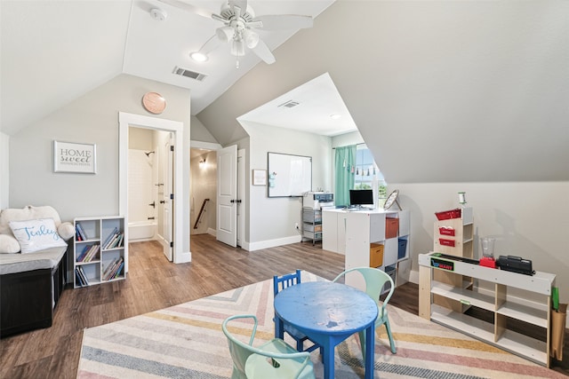 interior space featuring lofted ceiling, hardwood / wood-style flooring, and ceiling fan