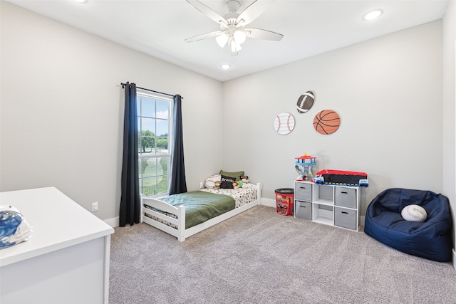 carpeted bedroom with ceiling fan