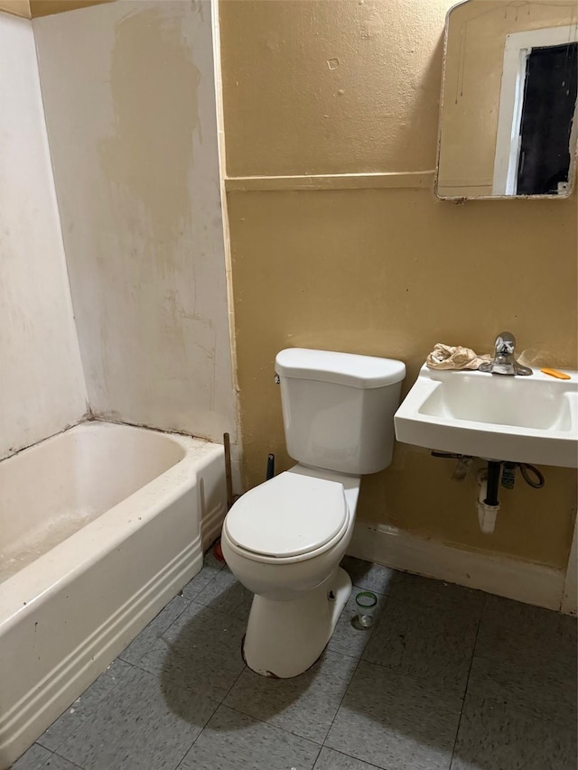 3114 W College St, Shreveport, LA 71109 - bathroom with a tub, tile patterned floors, toilet, a shower, and a sink