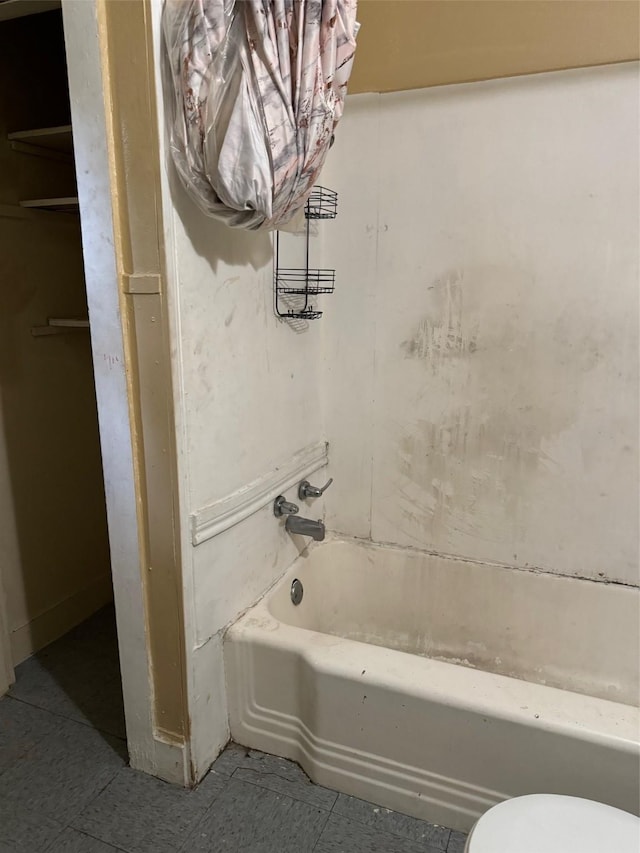 3114 W College St, Shreveport, LA 71109 - full bathroom with toilet, tile patterned floors, and shower / bathing tub combination
