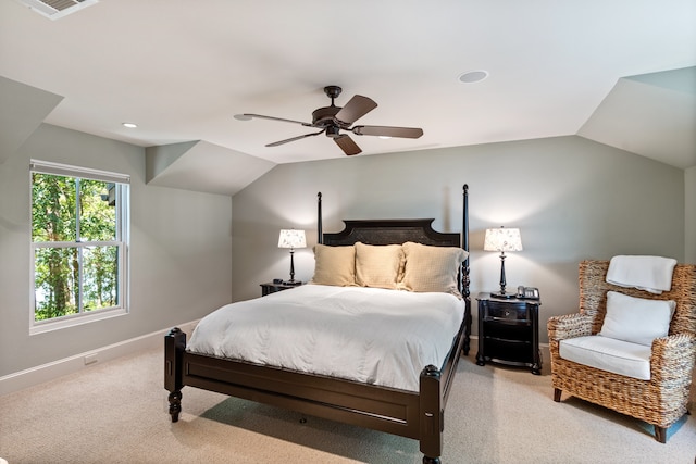 bedroom featuring carpet flooring, ceiling fan, and vaulted ceiling