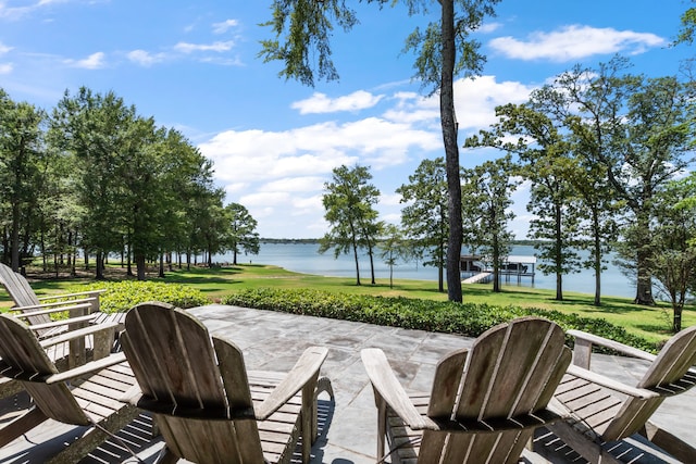 view of patio / terrace with a water view