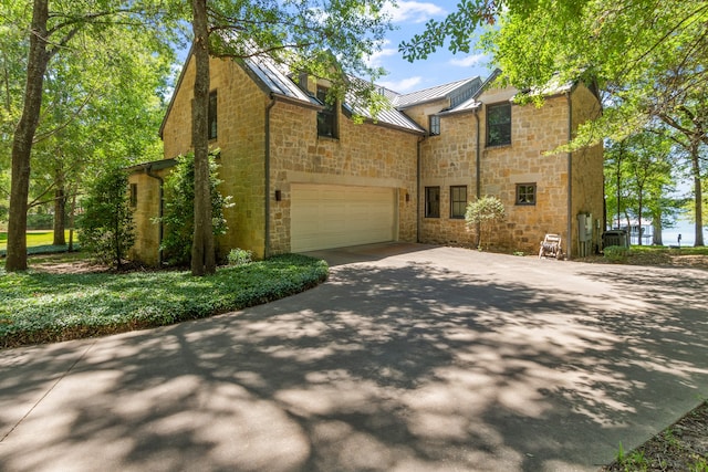 view of front of property with a garage