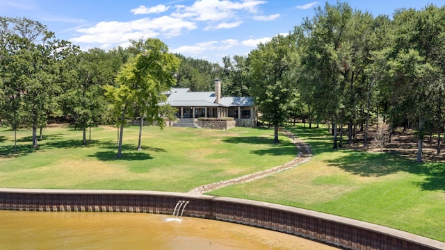 exterior space with a water view