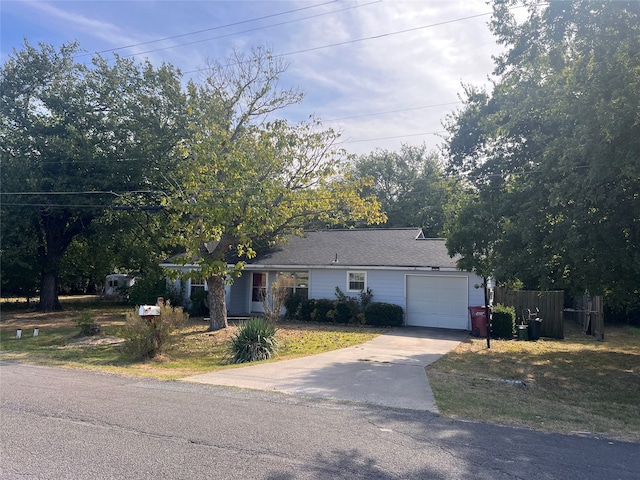 single story home featuring a garage