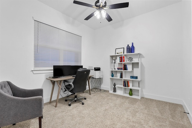 office with light carpet and ceiling fan