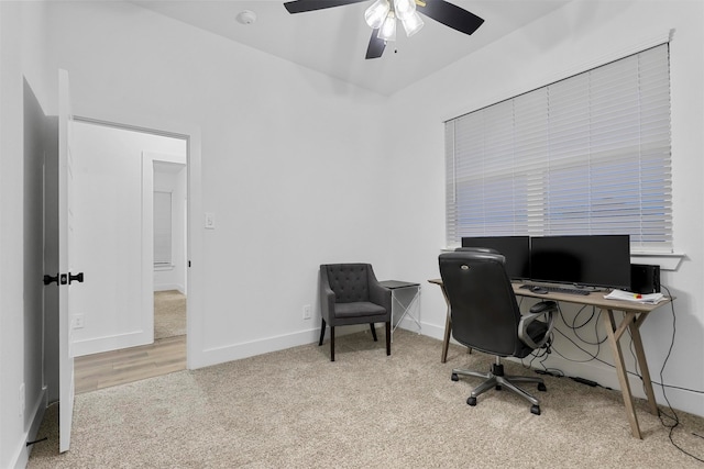 office area featuring light hardwood / wood-style floors and ceiling fan