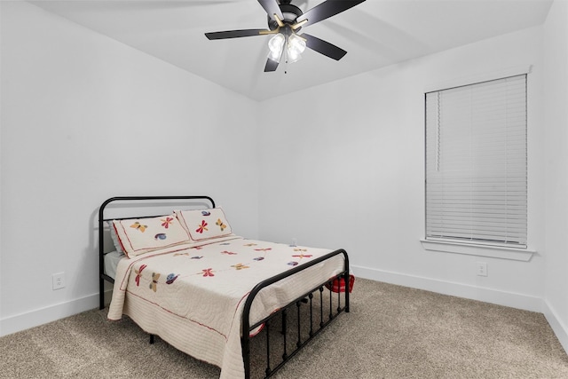 bedroom with ceiling fan and carpet floors