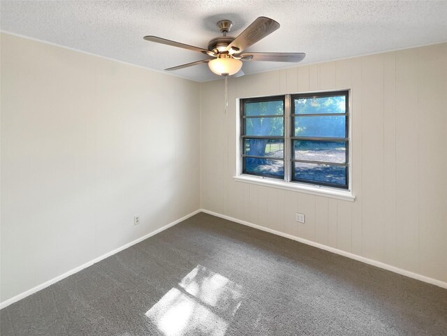 unfurnished room featuring ceiling fan, carpet, and a healthy amount of sunlight