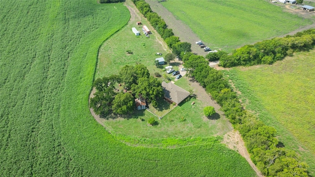 birds eye view of property with a rural view