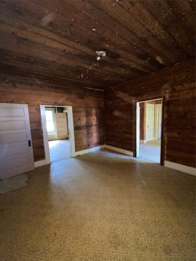 interior space featuring wooden walls