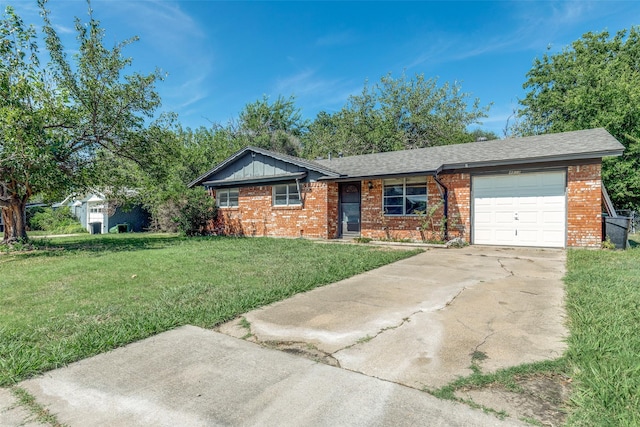 ranch-style home featuring a garage and a front lawn