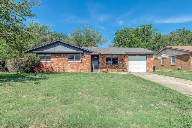 single story home featuring a front lawn and a garage