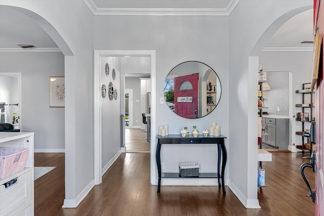 hallway with crown molding and dark hardwood / wood-style flooring