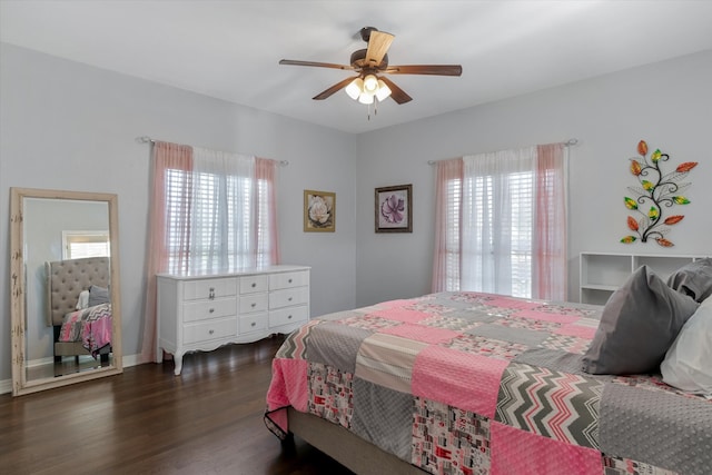 bedroom featuring ceiling fan and dark hardwood / wood-style floors