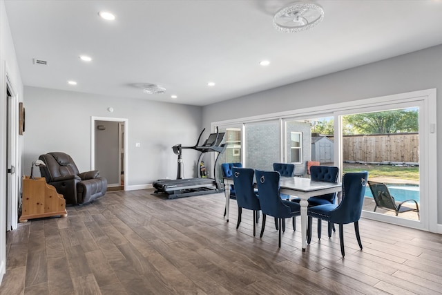 dining space featuring hardwood / wood-style flooring