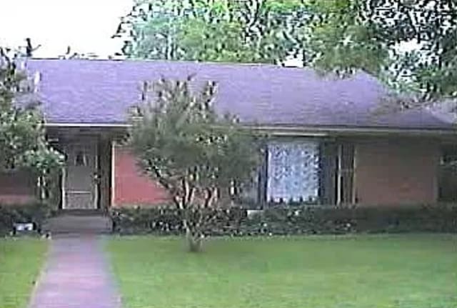 view of front of home with a front yard