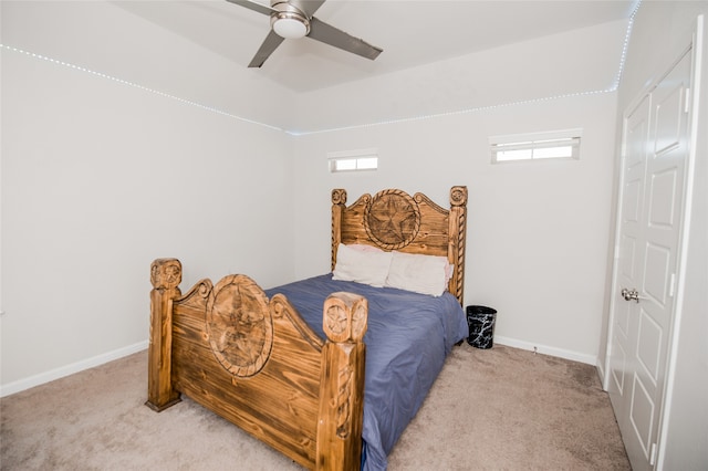 carpeted bedroom featuring ceiling fan