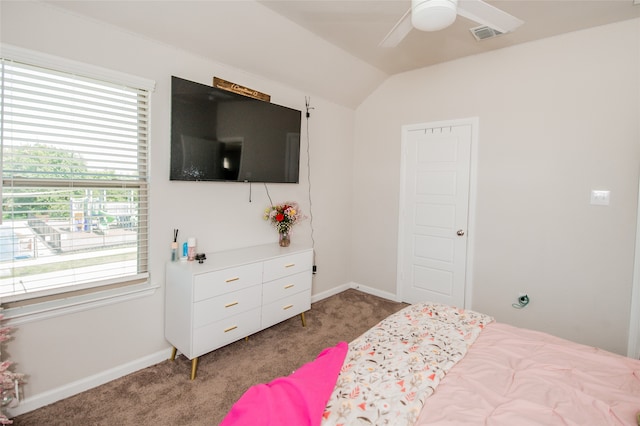 carpeted bedroom featuring ceiling fan and lofted ceiling