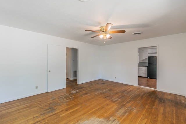 unfurnished room featuring wood-type flooring and ceiling fan