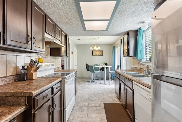 kitchen with backsplash, ventilation hood, sink, white appliances, and light tile patterned flooring