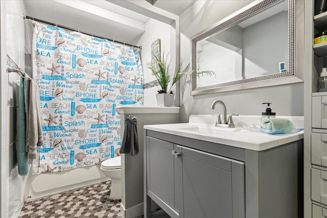 full bathroom featuring toilet, shower / tub combo, tile patterned flooring, and vanity