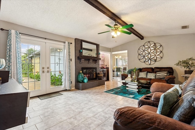 tiled living room featuring vaulted ceiling with beams, a brick fireplace, french doors, ceiling fan, and brick wall