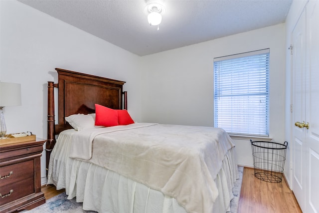 bedroom featuring light wood-type flooring